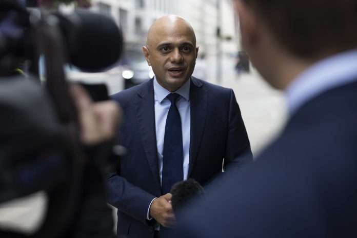 "132 million vaccinations in a single year is astounding and a true reflection of the fantastic work of our NHS and its volunteers - I want to thank each and every one of them" - Secretary of State for Health and Social Care Sajid Javid. Picture by Simon Dawson / No 10 Downing Street