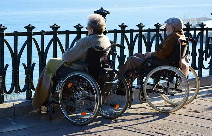 couple-3790756_1280 wheelchair