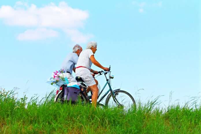 cycling elderly person-gfe8015ee2_1280
