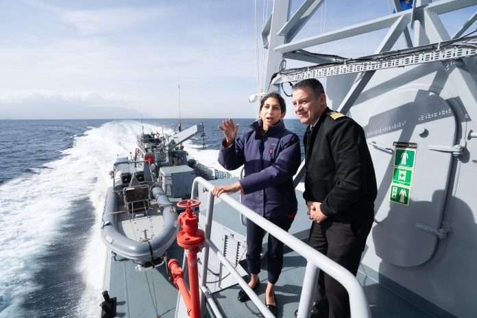 2T5B6EG Home secretary Suella Braverman on board an Hellenic Coastguard open patrol vessel the Fournoi with Coastal Commander Dimitri Tsinias (right) off the island of Samos where she met crew and saw how the Greek authorities are trying to cracking down on migrant crossings. The Home secretary is on a two day visit to the region to discuss migration and security. Picture date: Saturday November 4, 2023. P