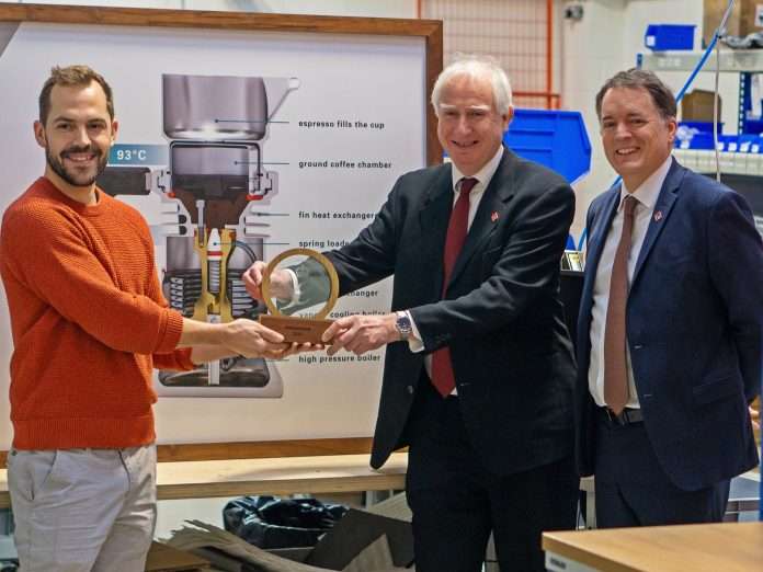 L-R William Playford, inventor and founder of 9Barista, showcases the Kings Award in Innovation 2024 with Daniel Zeichner MP and Made in Britain CEO John Pearce