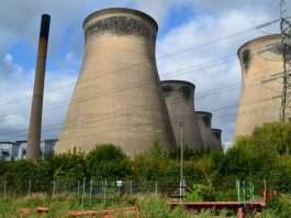 Energy bills still rise as electricity VAT cut takes effect Cooling towers at a British power station under grey sky