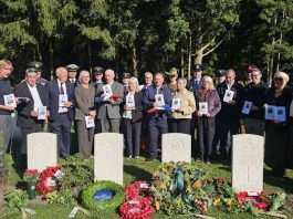 Two Sheffield men among six wartime servicemen named after more than 80 years Family members and military representatives stand behind the newly named headstones of the Lancaster PD374 crew, with wreaths and flowers, at Venray War Cemetery in the Netherlands